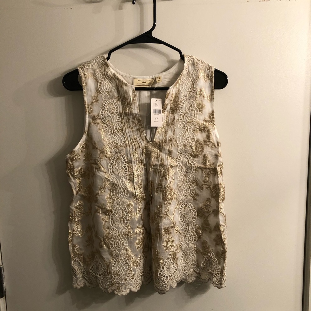 Anthropologie sleeveless cream blouse